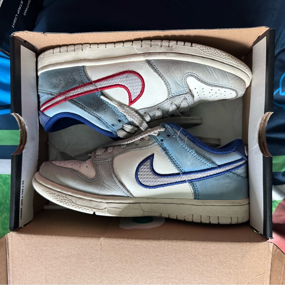 Nike Sneakers with Red and Blue Accents